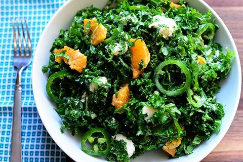 kale citrus salad with blue napkin