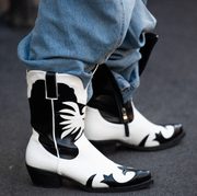 Street Style - Day 1 - Milan Fashion Week Fall/Winter 2022/2023 milan, italy february 23 a guest is seen wearing cowboy boots outside of alberta ferretti fashion show during the milan fashion week fallwinter 20222023 on february 23, 2022 in milan, italy photo by christian vieriggetty images