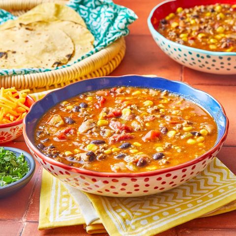 taco soup with tortillas in back