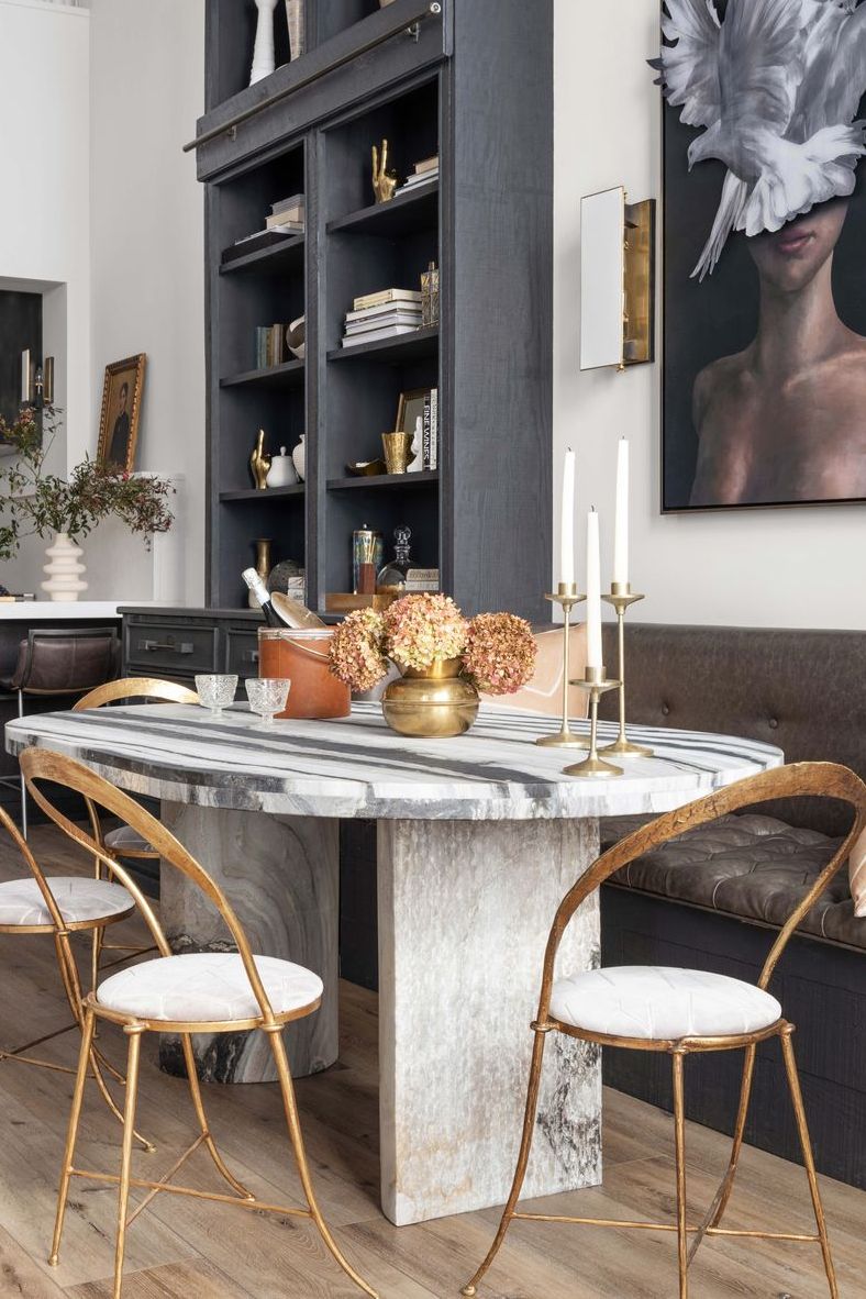 marble table with gold candlesticks and accents