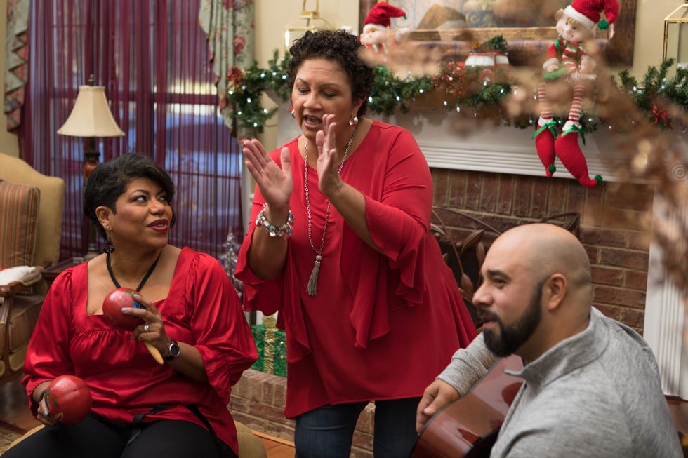 christmas trivia, family and friends dancing and playing musical instruments