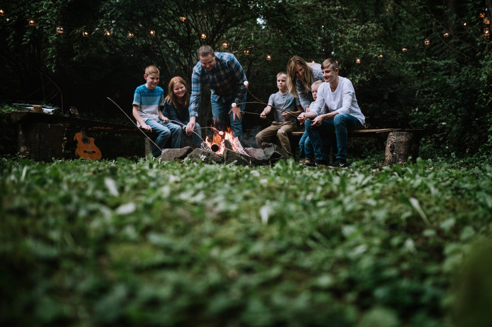 family fun around a campfire with s'mores