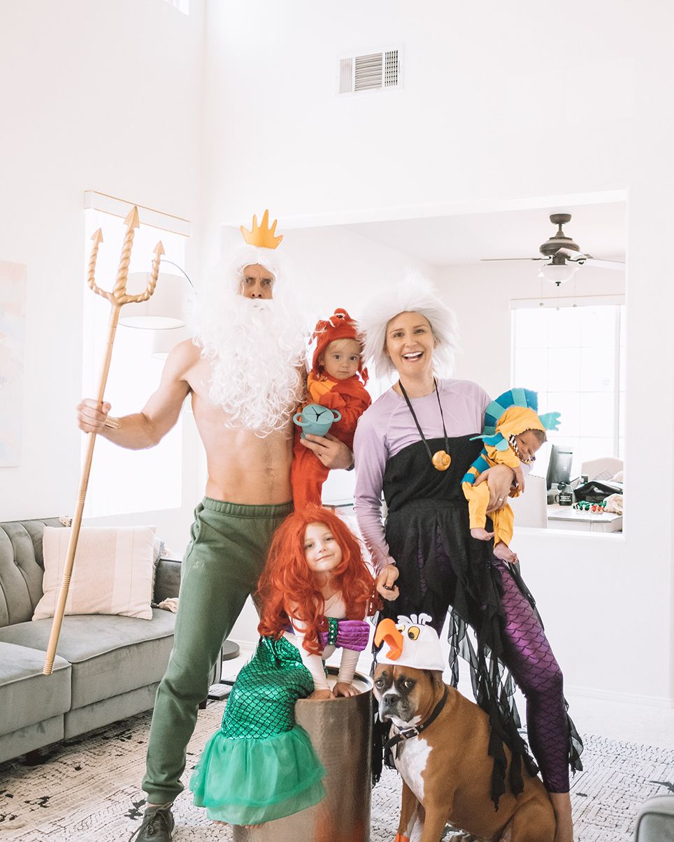 little mermaid family costume for 5 with ursula mom, king triton dad, dog as scuttle, 3 kids as aerial, flounder, sebastian