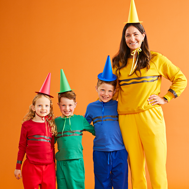 one family dressed up as a pack of crayons and another dressed as minions