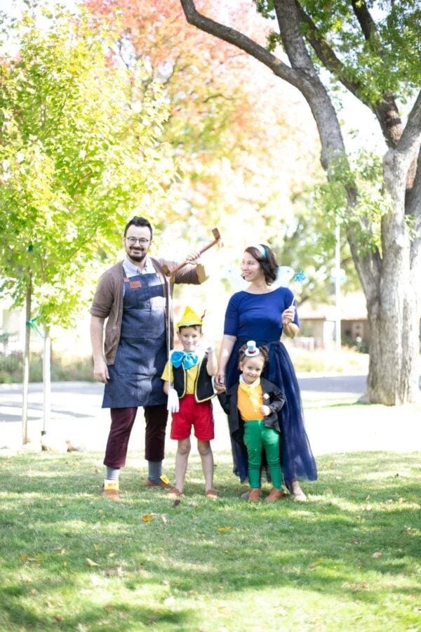 A Pinocchio family Halloween costume with Geppetto, Pinocchio, Blue Fairy and Jiminy Cricket a pinocchio family halloween costume with geppetto, pinocchio, blue fairy and jiminy cricket