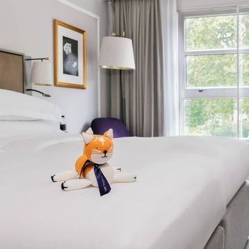 a bedroom with a bed and toys at hyatt regency london the churchill