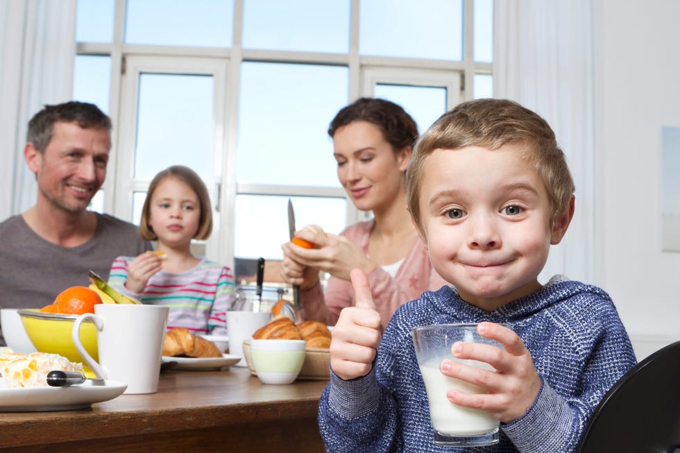 family of four having healthy breakfast