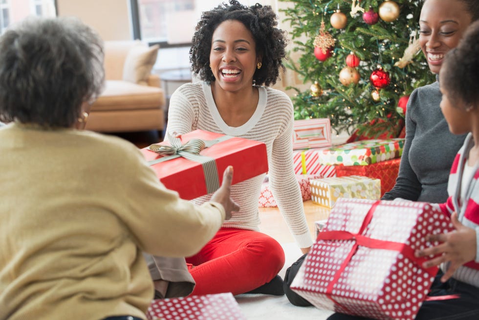 family opening christmas presents together