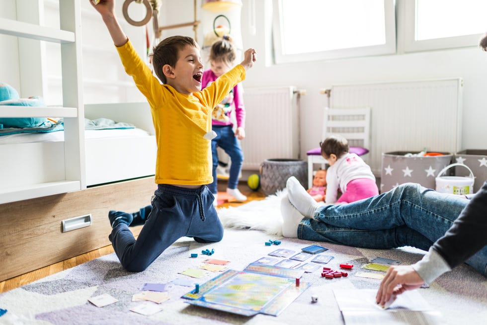 family playing board game