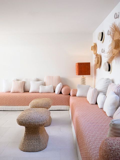 family room with peach sofa and hat gallery wall