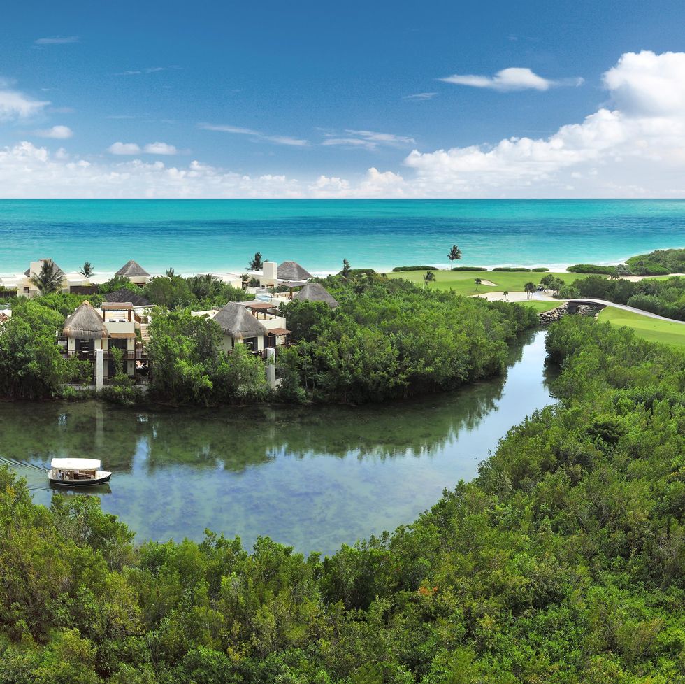 an aerial view of the beach at fairmont mayakoba, a good housekeeping pick for best family resort