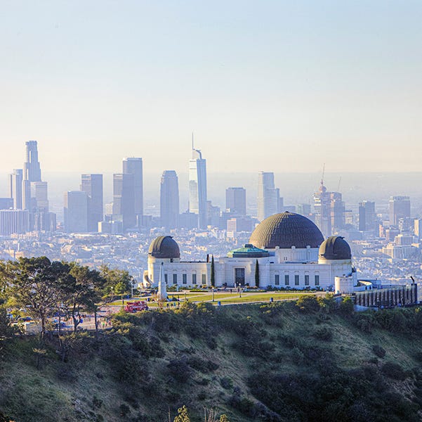 Morning scenery of Griffith Observatory and downtown LA. Los Angeles is Good Housekeeping pick for best family vacation destinations morning scenery of griffith observatory and downtown la los angeles is good housekeeping pick for best family vacation destinations