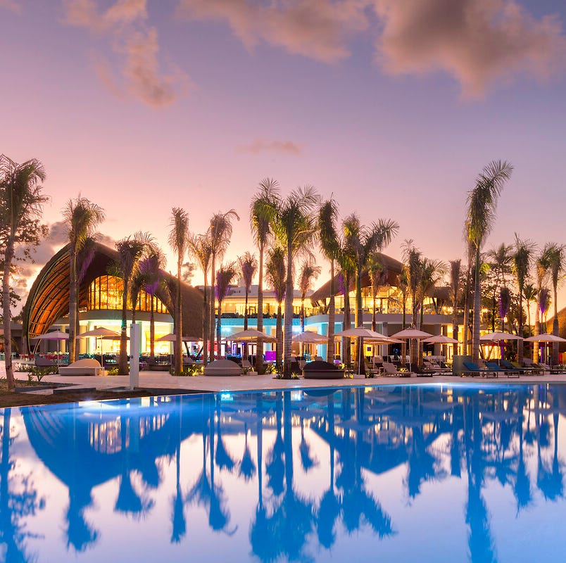 The sunset at Club Med Michès Playa Esmeralda, a Good Housekeeping pick for best family vacation destinations the sunset at club med michès playa esmeralda, a good housekeeping pick for best family vacation destinations