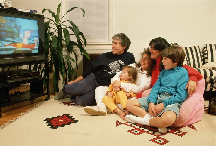 Somewhere in the 90s, you're in your living room with your family
