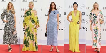 women showcasing various fashionable dresses on a red carpet