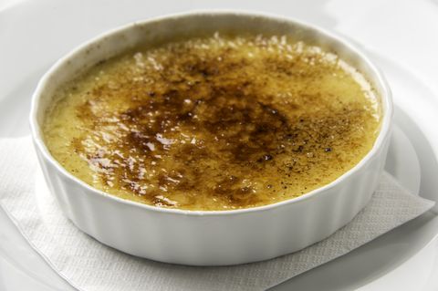 Fancy picture of a crème brulee standing on a napkin
