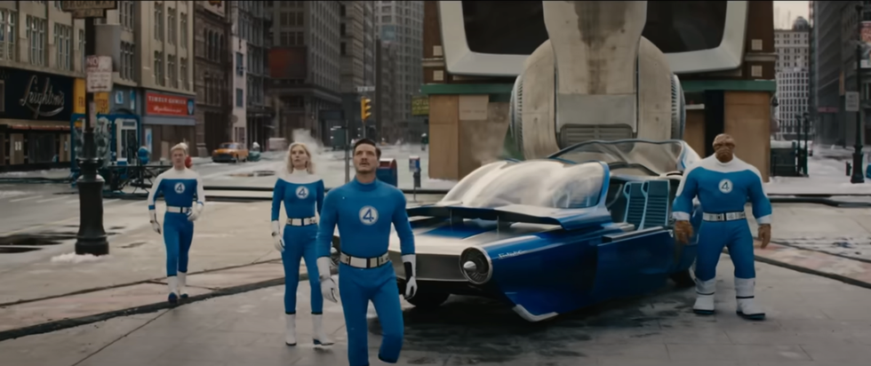 the fantastic four in front of a sign that says timely comics