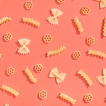 Farfalle, rotelle and fusilli pasta flat lay