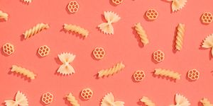 Farfalle, rotelle and fusilli pasta flat lay