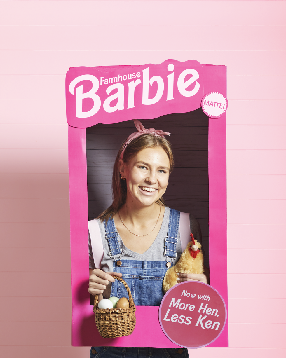farmhouse barbie halloween costume diy featuring a woman in a cardboard box holding a chicken and a basket of farm eggs