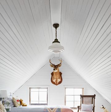 new york home of christina salway and her husband john moskowitz attic turned bunkroom housing five antique twin beds