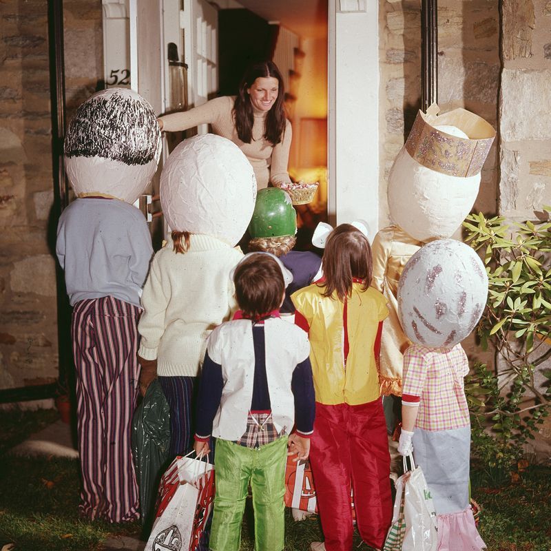 halloween trivia trick or treaters outside a woman's house