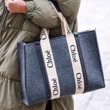 a model carries a chloe bag in a guide to street style wuerzburg january, 2022