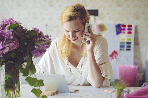 jobs for stay at home moms - Fashion designer is talking with the client on the phone