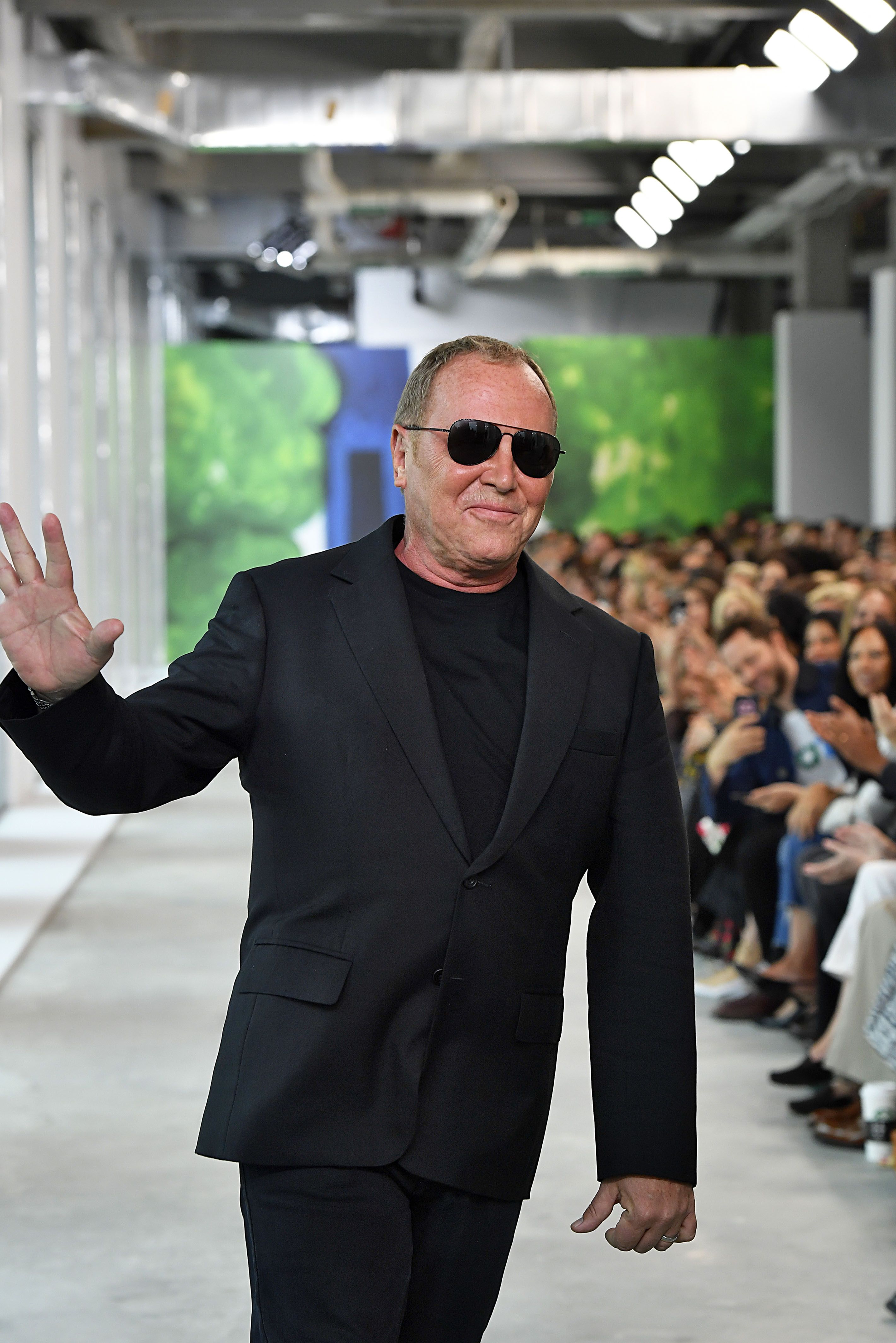 Designer Michael Kors holds first live fashion show since pandemic