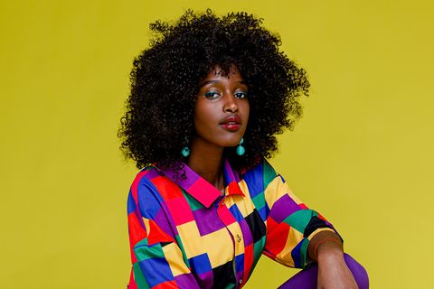 fashionable woman in colorful shirt
