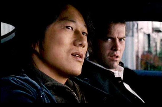 sung kang as han and lucas black as sean drive around in a scene from the fast and the furious tokyo drift