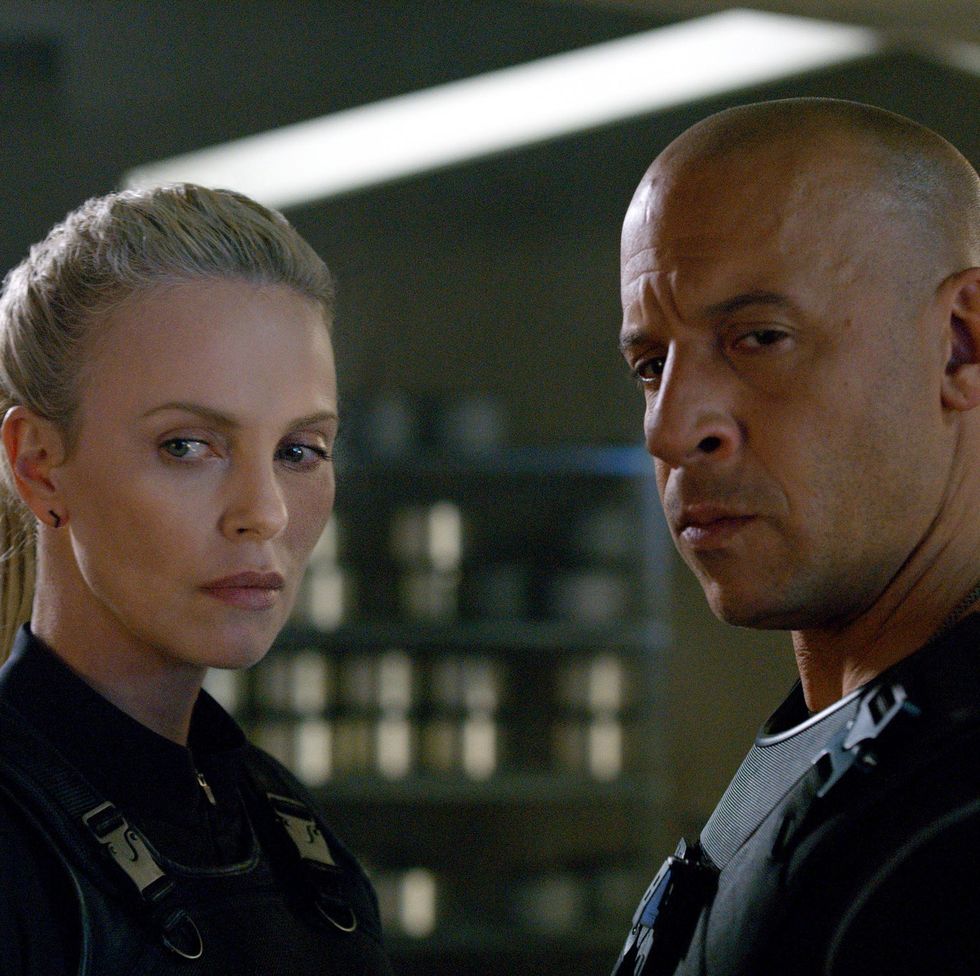 charlize theron as cipher and vin diesel as dom square off in a scene from the fate of the furious