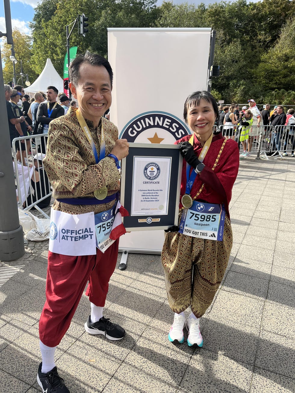 teerawut and sasipean pattaraosol are now the fastest married couple to have run a marathon in traditional thai dress