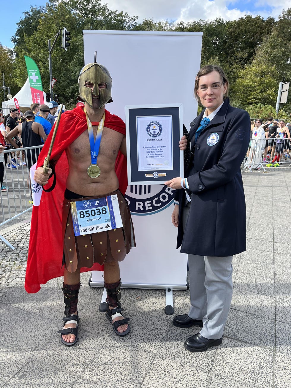 gianluca tortora is ﻿the fastest male to have run a marathon dressed as a spartan warrior