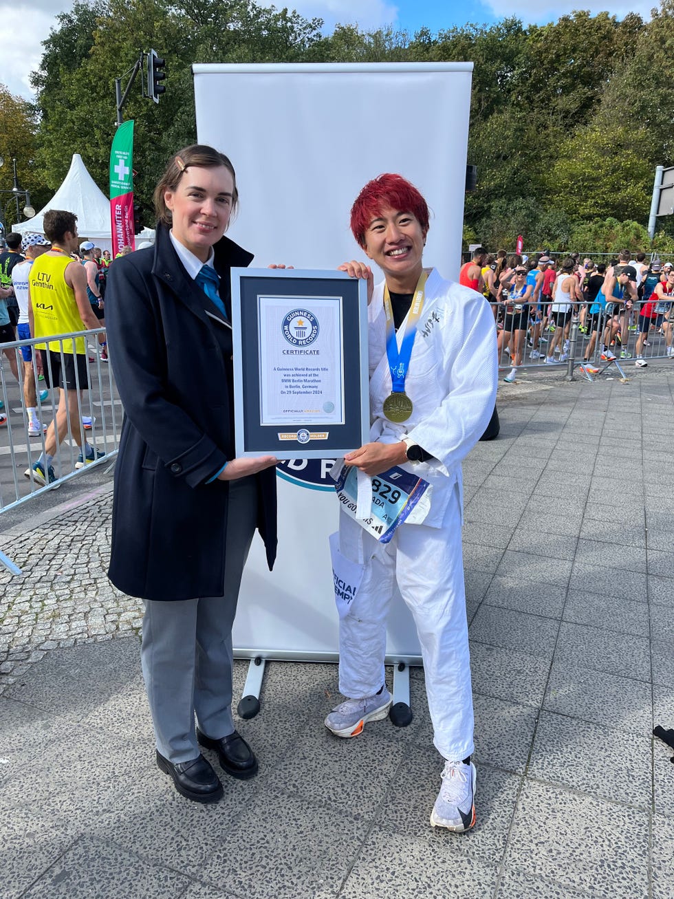 hibiki kowada, who became the fastest male to run a marathon in a martial arts suit in berlin