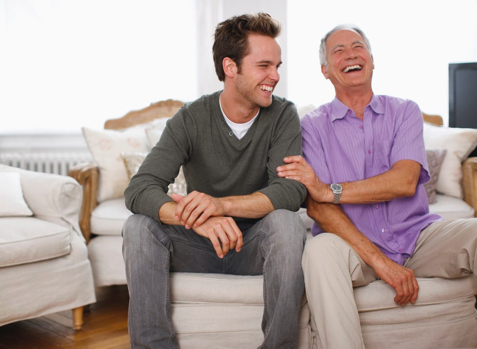 father and son laughing