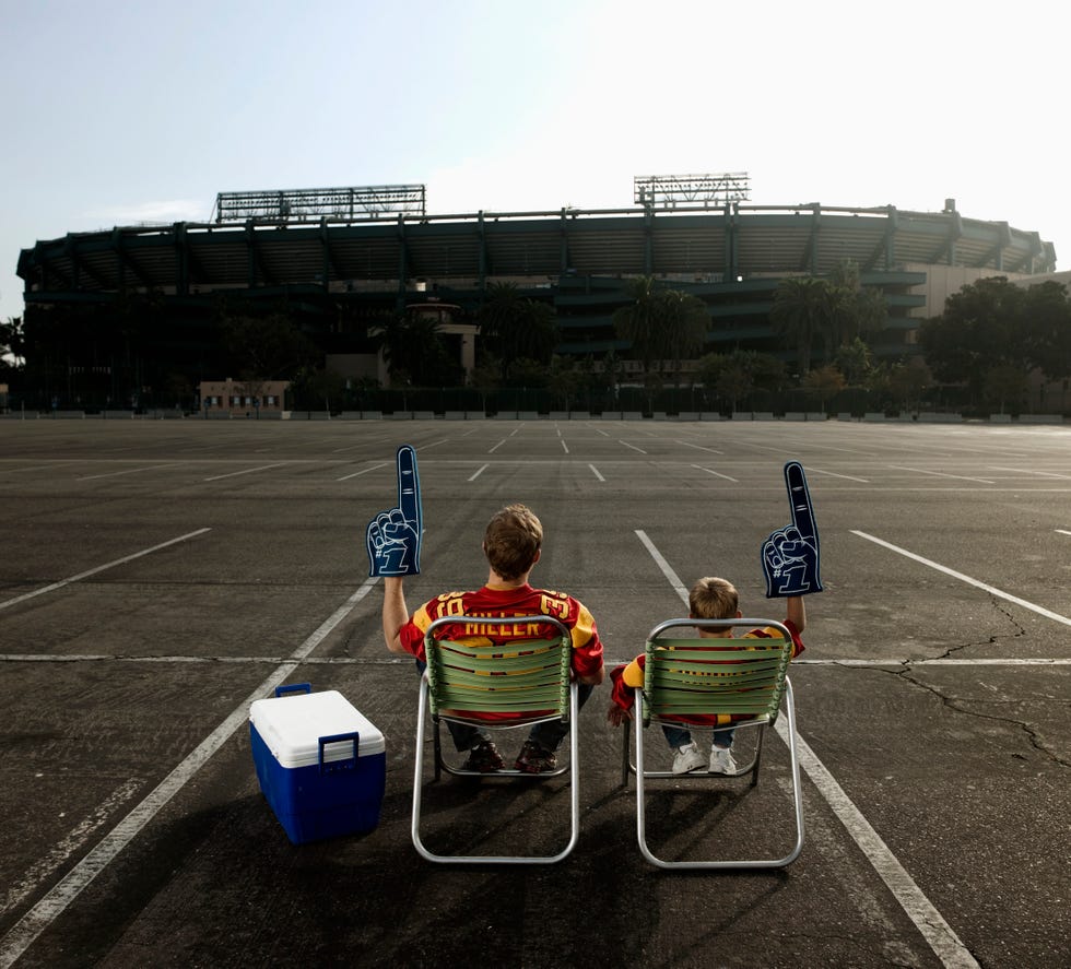 father and son tailgating