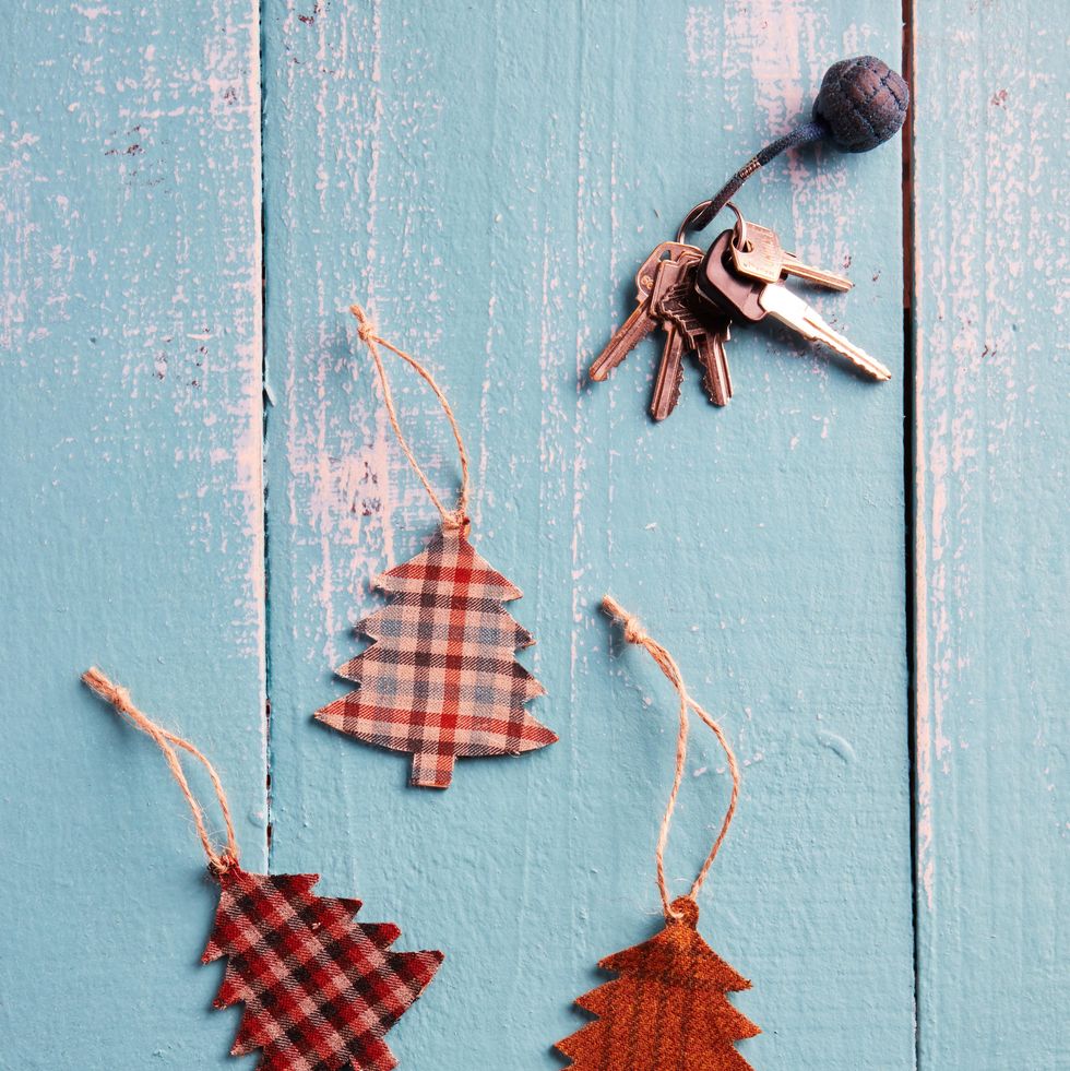 three tree shaped diy air fresheners covered with plaid fabric