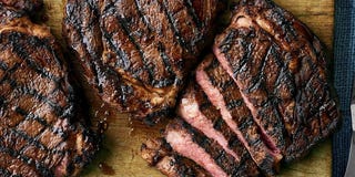 fathers day dinner recipes lemon pepper grilled steak on cutting board
