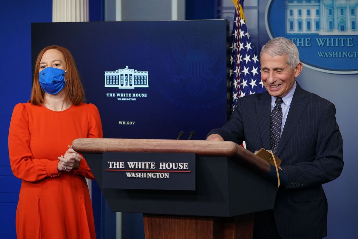 director of the national institute of allergy and infectious diseases anthony fauci smiles as white house press secretary jen psaki l speaks to reporters during the daily briefing in the brady briefing room of the white house in washington, dc on january 21, 2021 photo by mandel ngan  afp photo by mandel nganafp via getty images