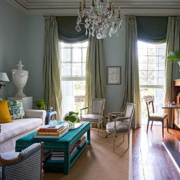 the living rooms silk draperies and duck egg blue paint were existing