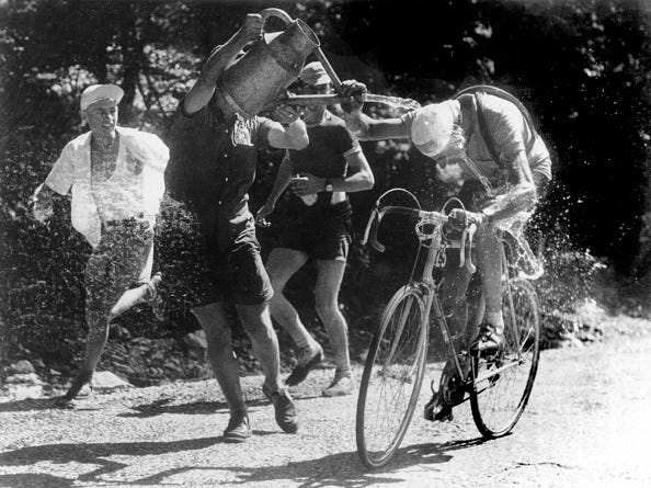 france   july 10  the italian cyclist fausto coppi, leader of the 1952 tour de france, being drenched with water by some of the spectators  photo by keystone francegamma keystone via getty images