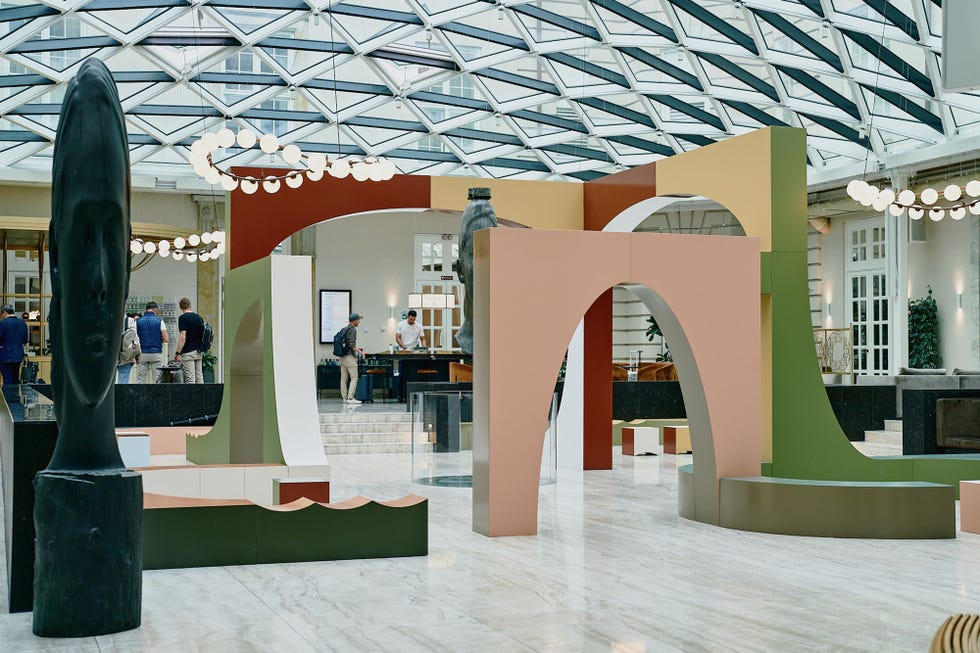 contemporary art installation in a modern indoor space featuring geometric structures