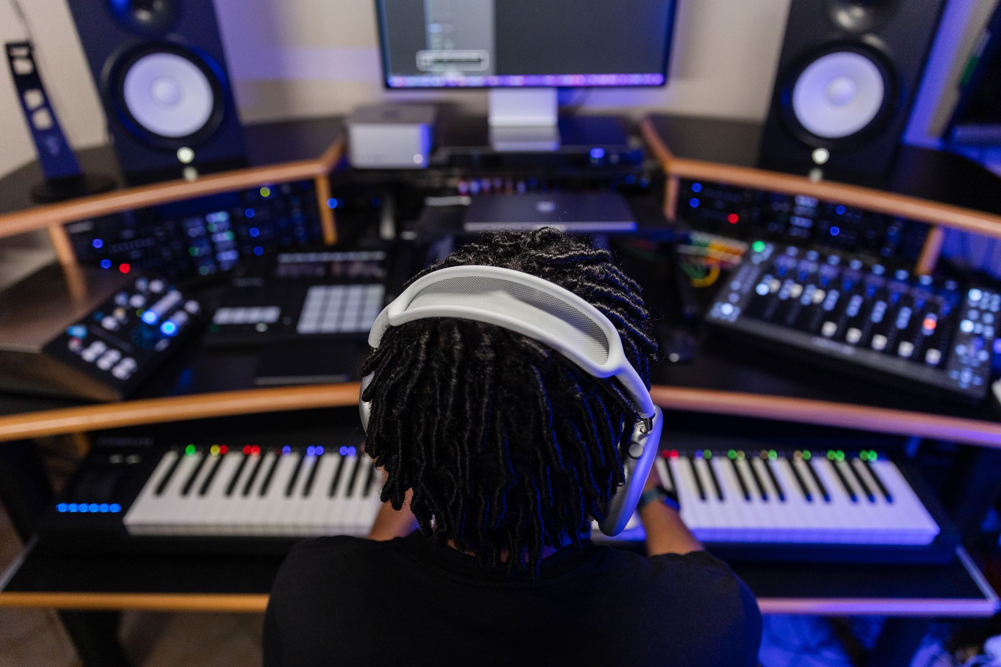whitaker creating music in his studio