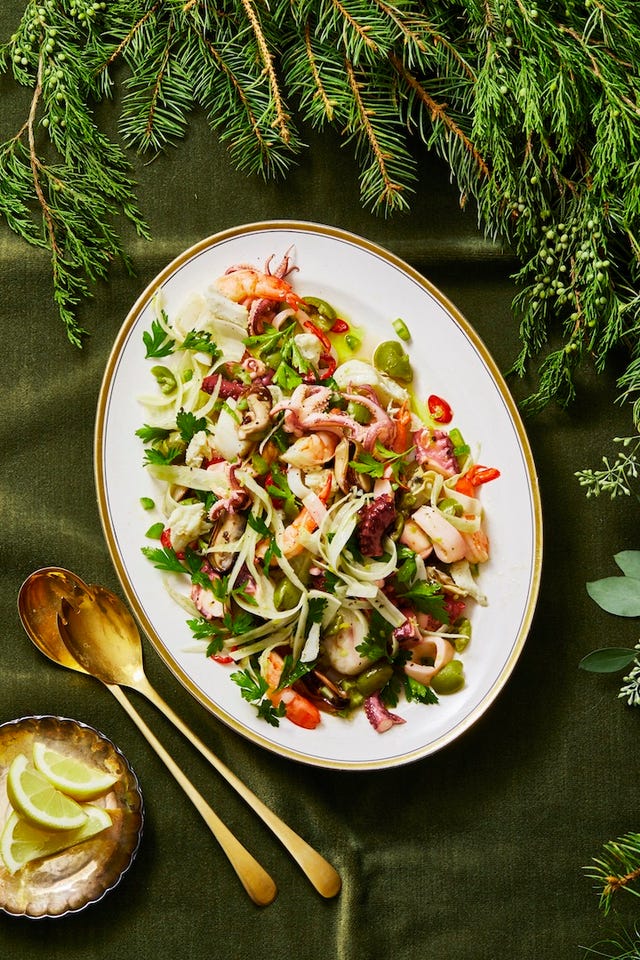 feast of the seven fishes salad on a white plate