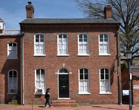 alexandria, va   april 21, 2018  an historic two story colonial era brick home built in the 18th century federal style of architecture in the old town section of alexandria, virginia photo by robert alexandergetty images