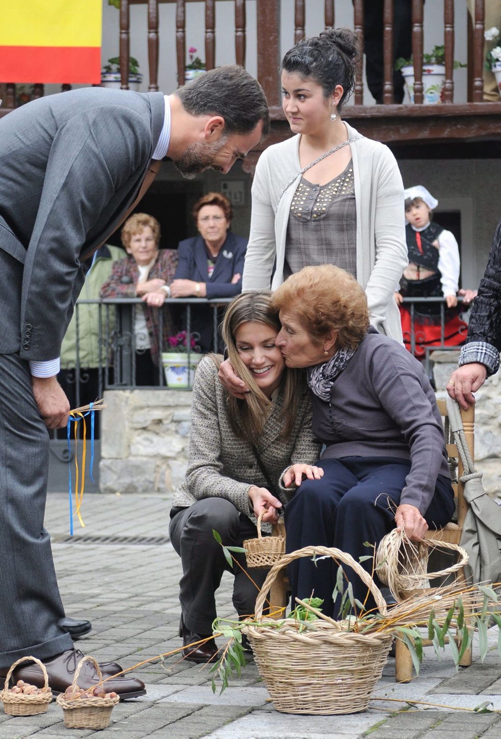 a group of people looking at shoes