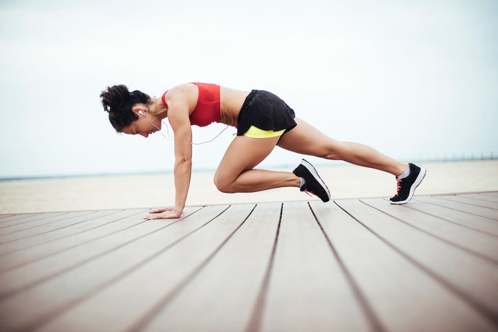 Female athlete doing morning exercise routine