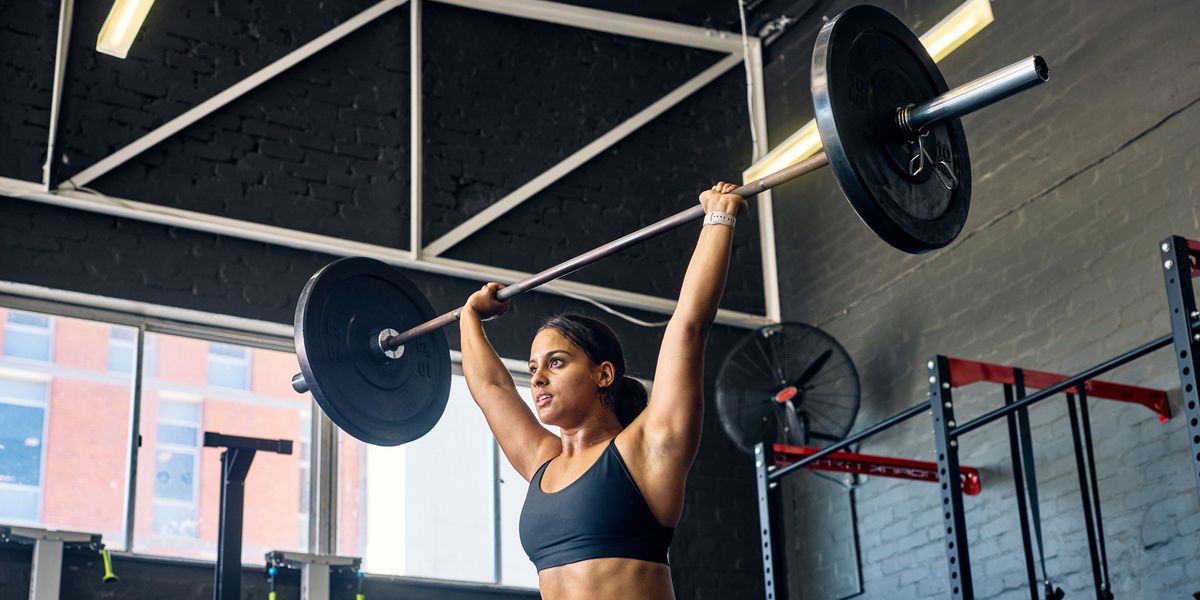 Why Scaling Back On Your Workouts Is The Key To Bigger Gains, According To Trainers