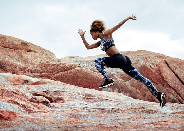 https://hips.hearstapps.com/hmg-prod/images/female-athlete-running-in-nature-high-res-stock-photography-855801176-1549998039.jpg?crop=1.00xw:0.706xh;0,0.110xh&resize=640:*